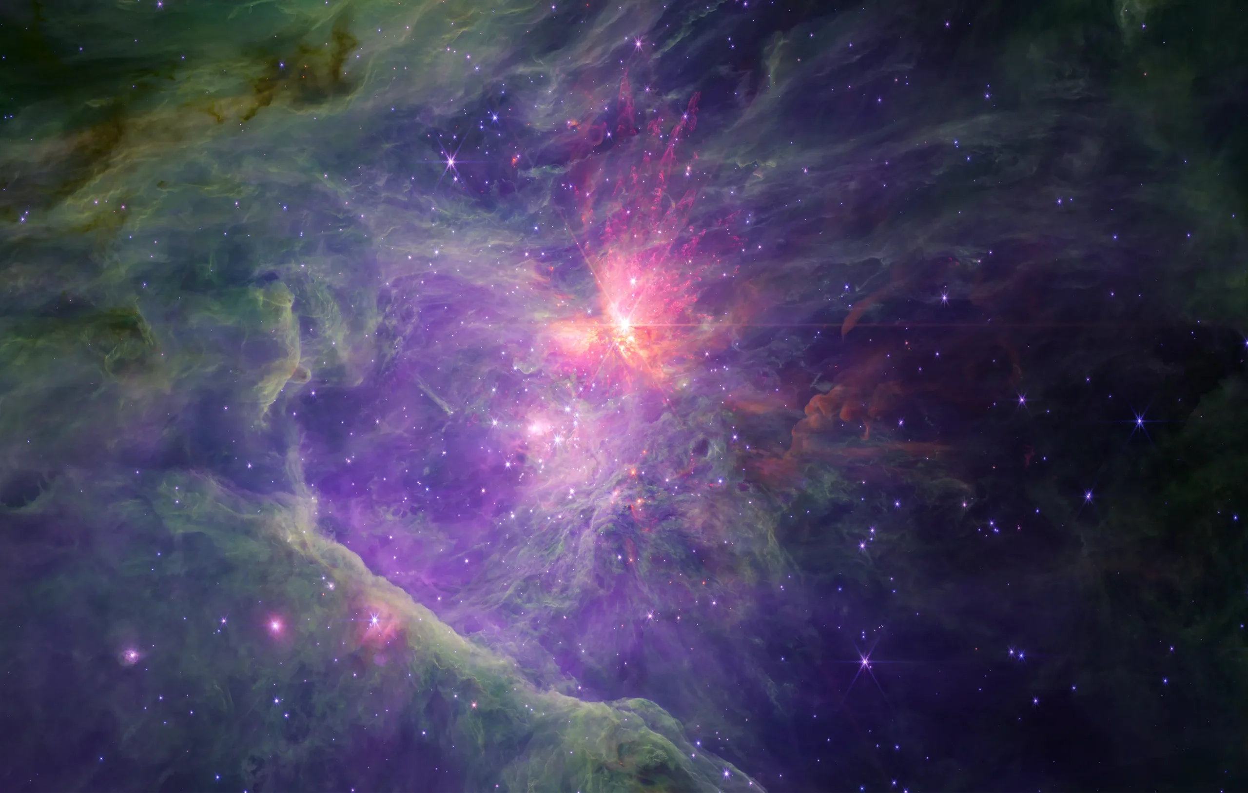 The Orion nebula, which looks like a large, lavender cloud studded with numerous stars.