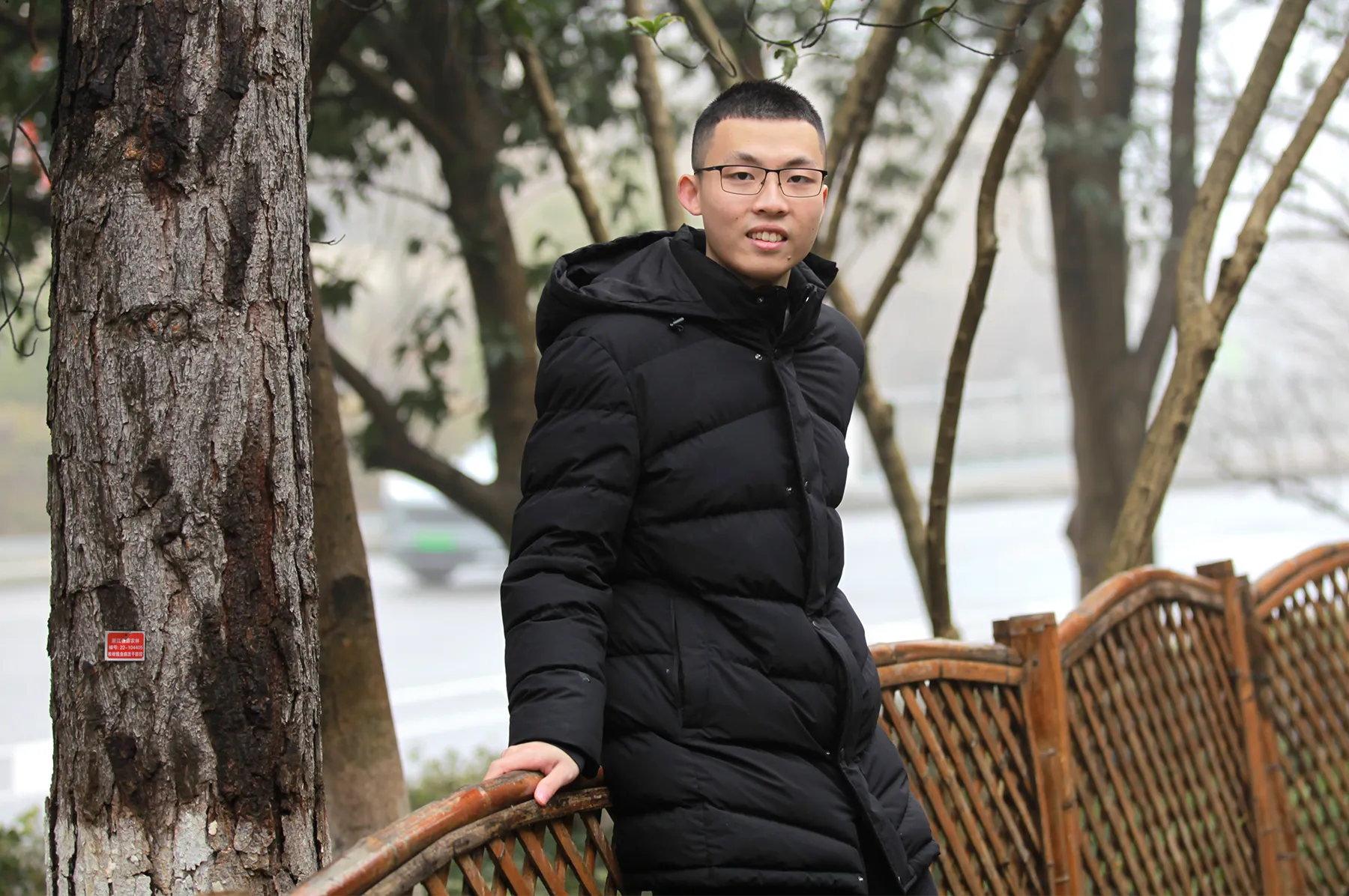 Renfei Zhou standing outdoors.