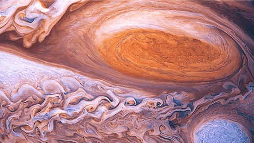 An animation in which gas rotates inside Jupiter’s Great Red Spot and smaller vortices swirl nearby.