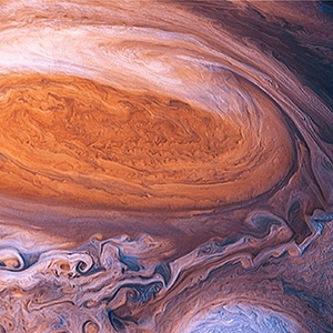 An animation in which gas rotates inside Jupiter’s Great Red Spot and smaller vortices swirl nearby.