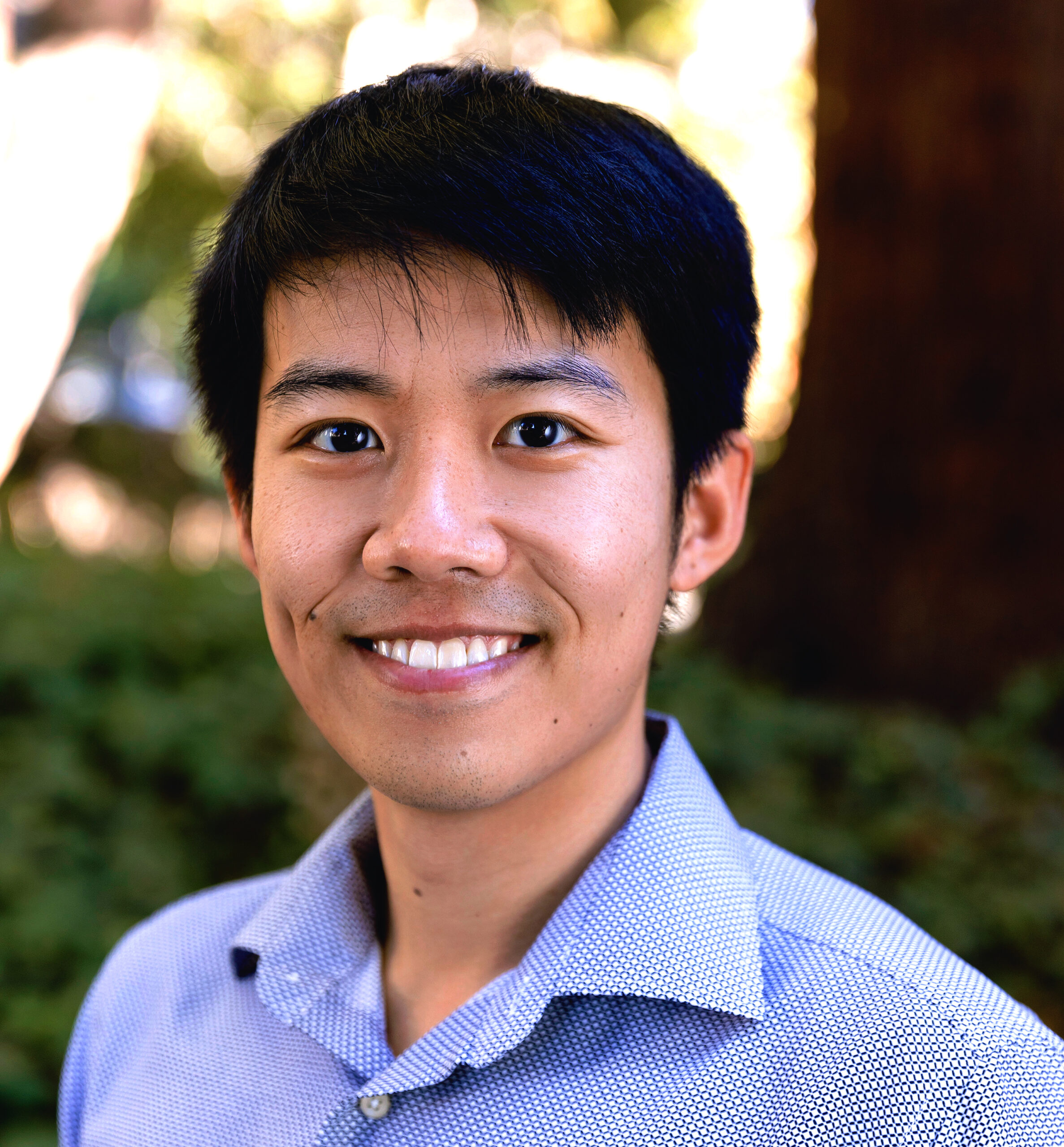 A man in a light blue shirt