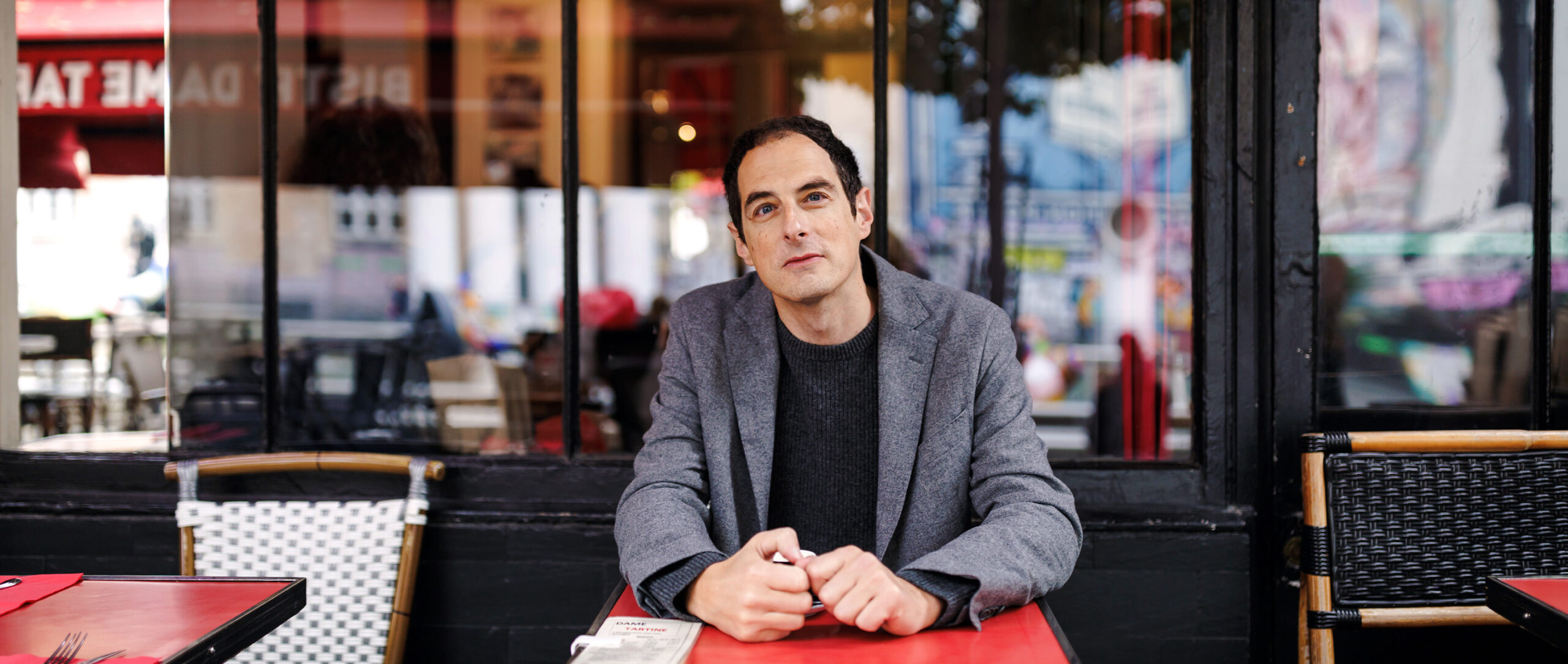 A man sitting in a cafe